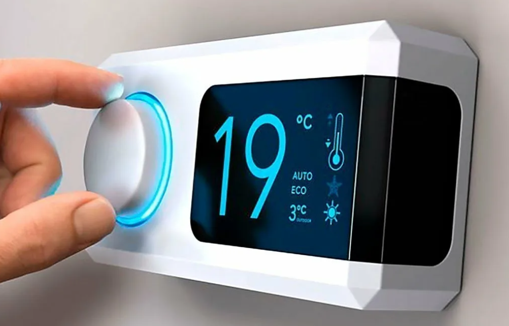 technician servicing a rooftop HVAC system